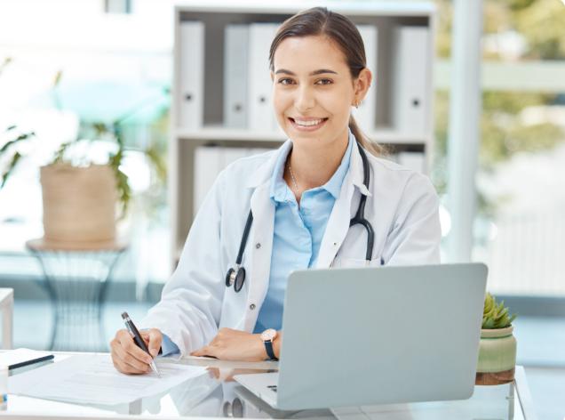 Doctor writing notes and prescriptions during an online consultation session