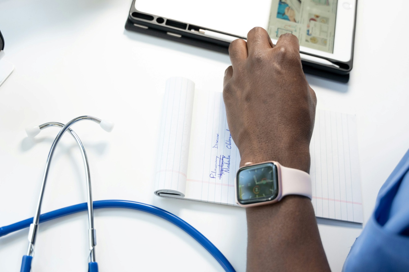 A doctor with a tablet