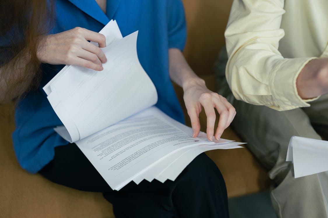 A person looking at documents