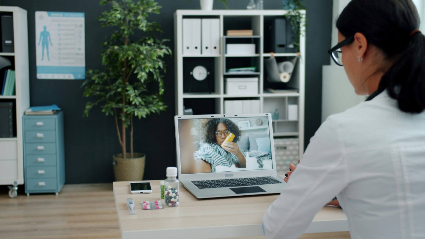 A doctor and patient over video call
