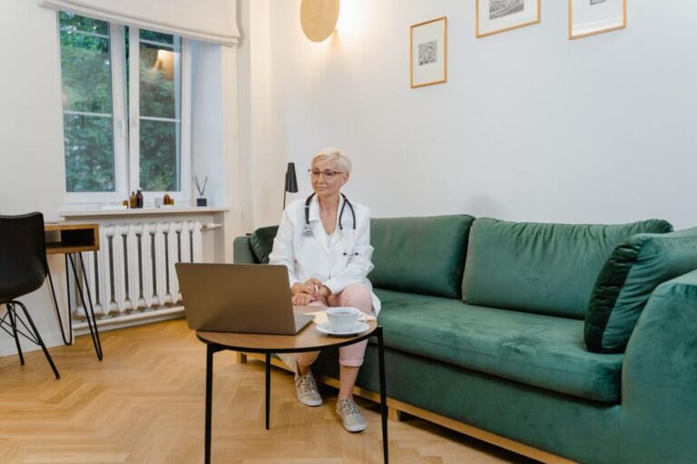 Doctor conducting a virtual doctor visit on a laptop to speed up patient treatment