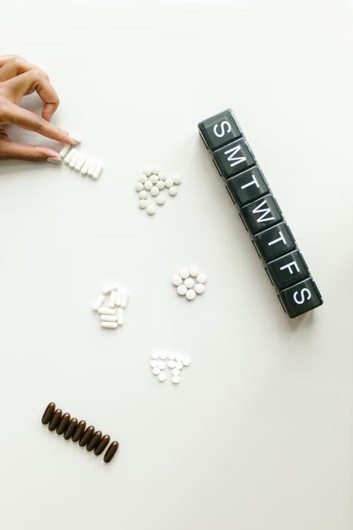 Weekly pill organizer used for medication management to avoid prescription interruptions
